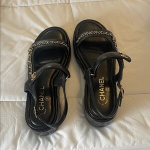CHANEL Black Sandals with Silver Chain Accent